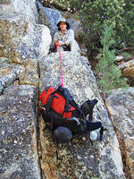 Lowering pack at a climbing section in Canon del Diablo (Photo Greg S.)